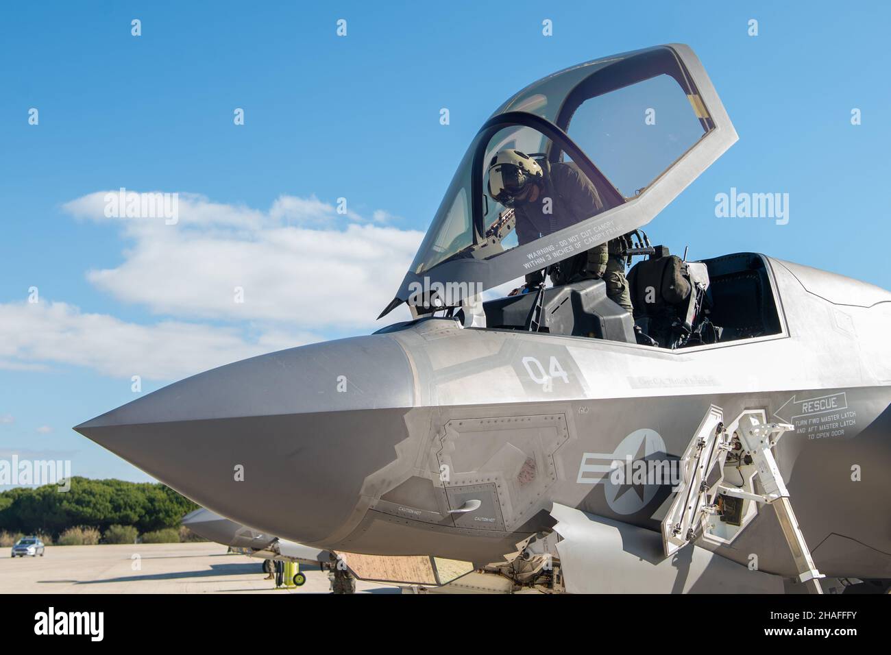 NAVAL STATION ROTA, Spain (November 30, 2021)- Marine Capt. Daniel Lengyel boards an F-35A Lightning II aircraft, assigned to Marine Fighter Attack Squadron (VMFA) 211, Naval Station (NAVSTA) Rota on Nov. 30, 2021. VMFA 211 are conducting pre-flight checks on NAVSTA Rota, Spain, before leaving to participate in exercises with Spanish and British Aircrafts. (U.S. Navy photo by Mass Communication Specialist 2nd Class Jacob Owen.) Stock Photo