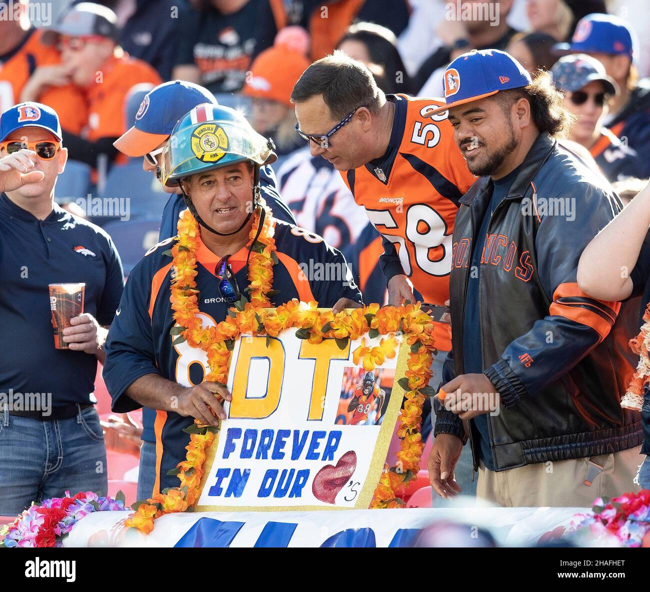 Denver, Colorado, USA. 12th Dec, 2021. Bronco fans show a sign in support of fallen Bronco