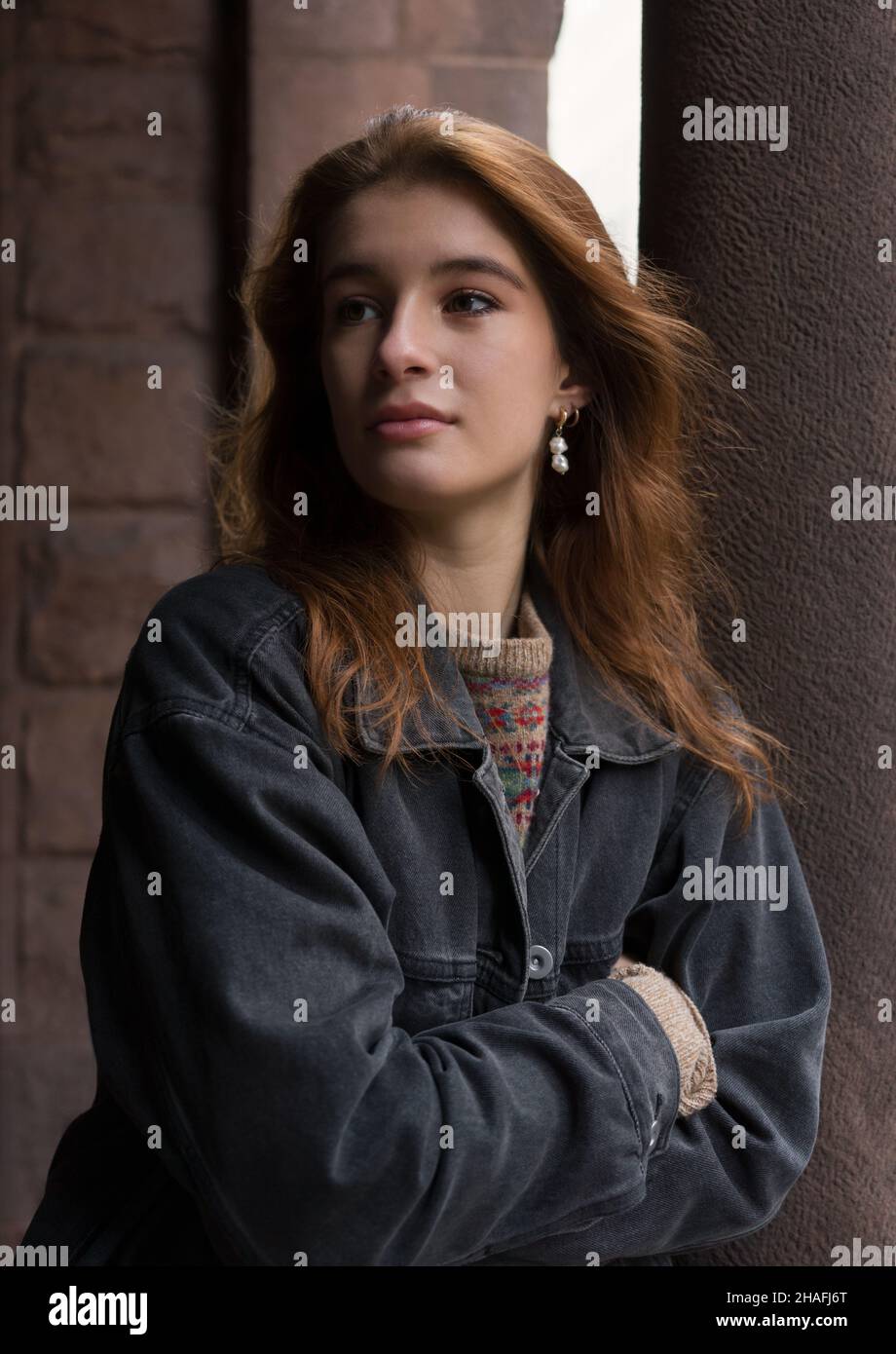 Portrait of a young woman with long red hair Stock Photo - Alamy