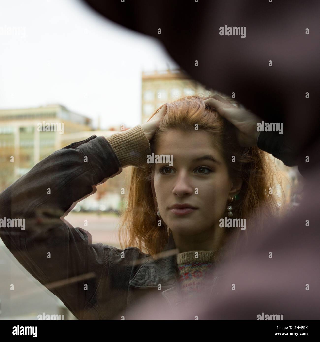 Portrait of a young woman with long red hair Stock Photo - Alamy