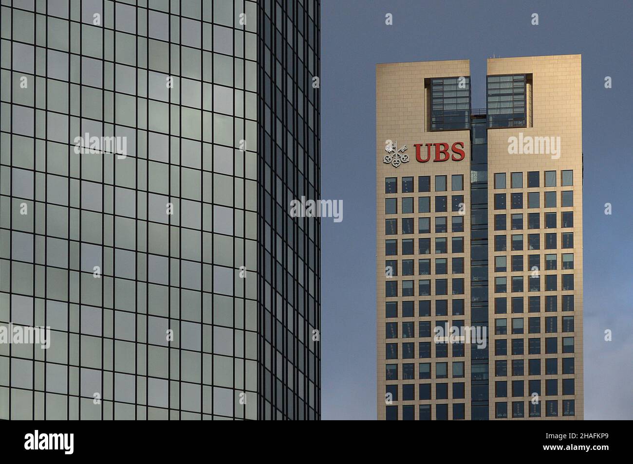 09 December 2021, Hessen, Frankfurt/Main: The UBS Group AG logo on the bank's headquarters in downtown Frankfurt. A Paris appeals court has reopened the accusations of tax fraud against the major Swiss bank UBS. As in the first instance, the bank faces a fine in the billions in the appeal process. Photo: Julia Cebella/dpa Stock Photo