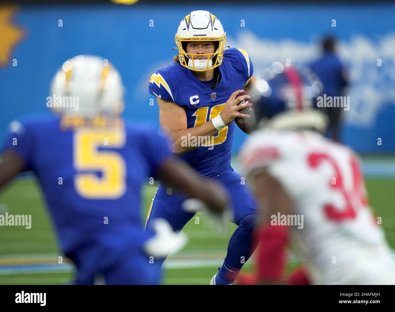 Los Angeles Chargers quarterback Justin Herbert runs for six yards in third quarter action against the New York Giants at SoFi Stadium on Sunday, December 12, 2021 in Inglewood, California. The Chargers defeated the Giants 37-21. Photo by Jon SooHoo/UPI Stock Photo