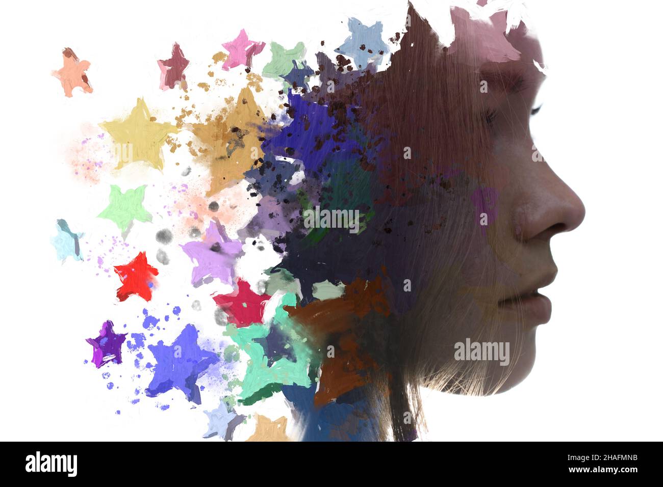 A profile portrait of a pretty woman combined with multicolored stars. Paintography. Stock Photo