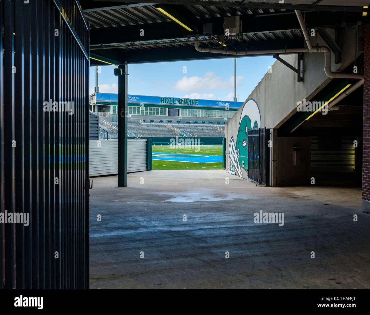 NEW ORLEANS, LA, USA - DECEMBER 10, 2021: Birdoff Family Student Tunnel at Yulman Stadium with view of stands, press box and football field Stock Photo