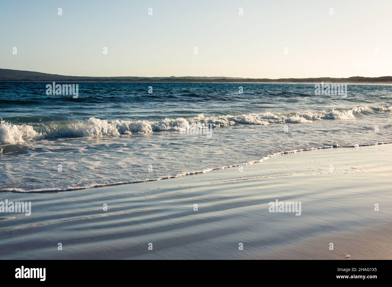 Clear blue water on white sand beach in Australia Stock Photo - Alamy