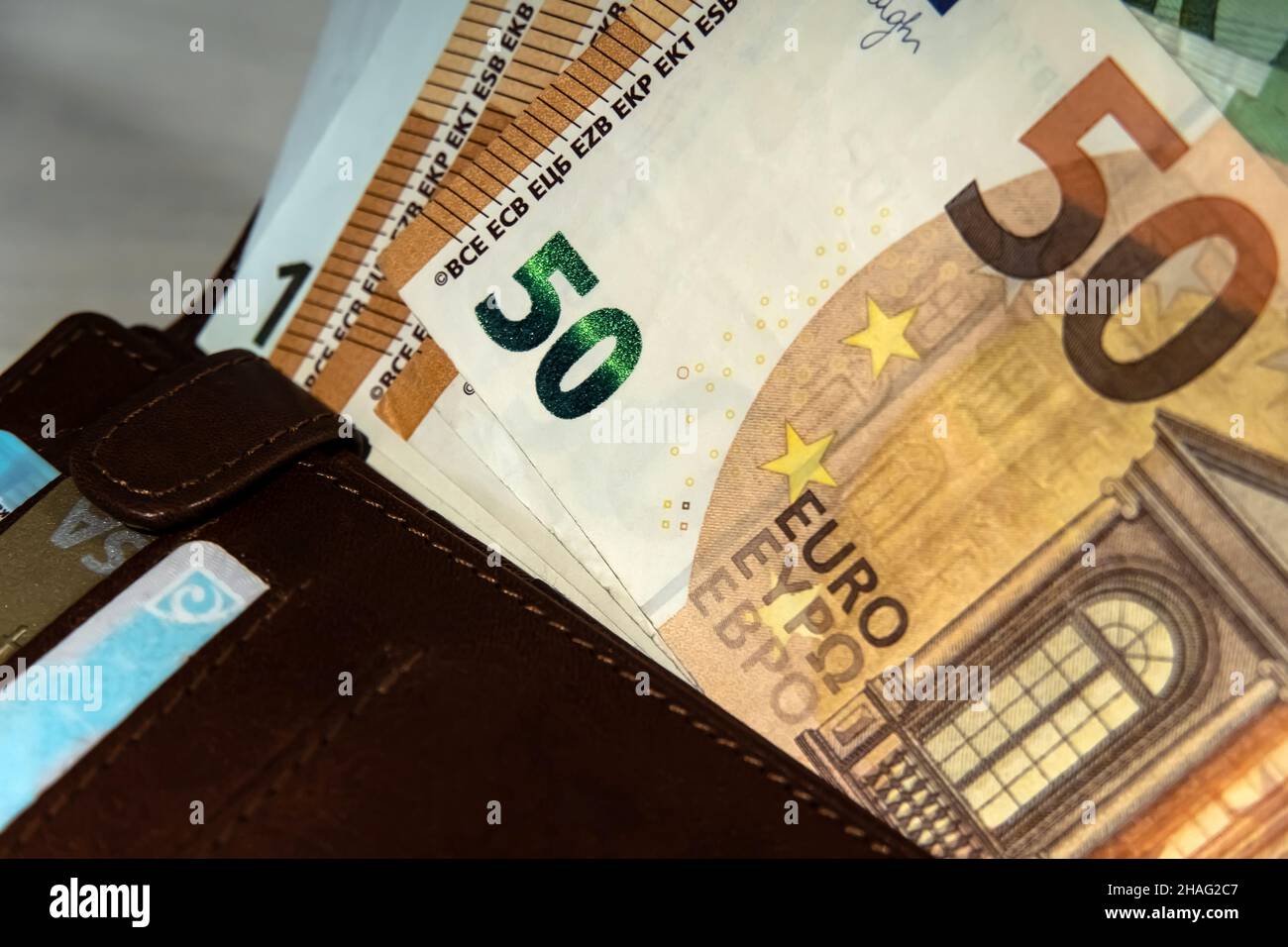 100 Euro To Cedis Euro cash is on the wallet with credit cards. A lot of money. Calculation  of financial donations. Accounting of funds.Means of payment and wages in  Eu Stock Photo - Alamy