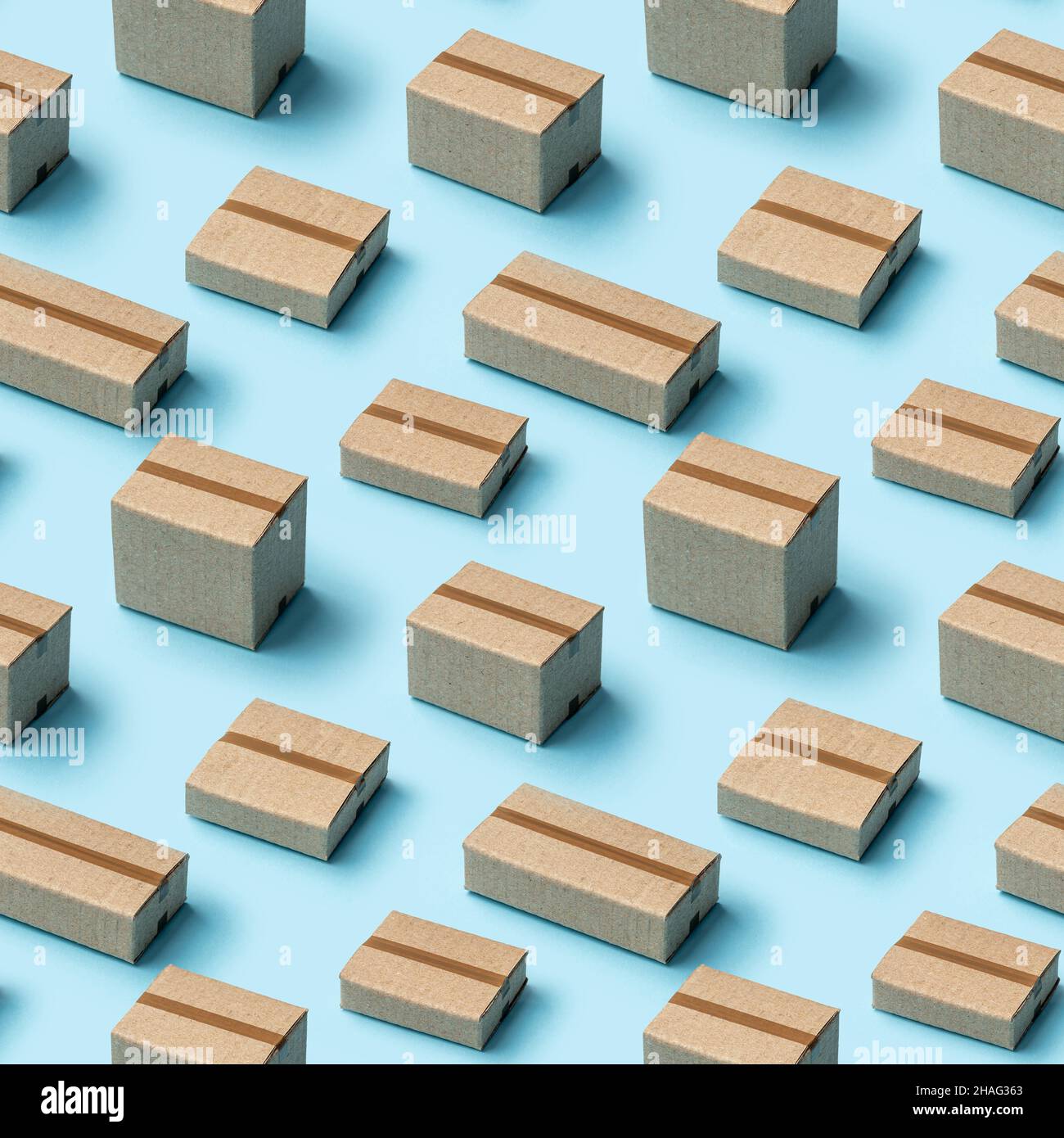Cardboard boxes seamless pattern on blue background. Stock Photo