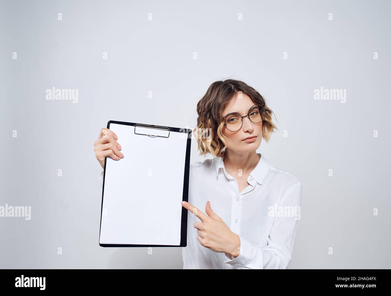 Business woman in white shirt documents secretary work Stock Photo - Alamy
