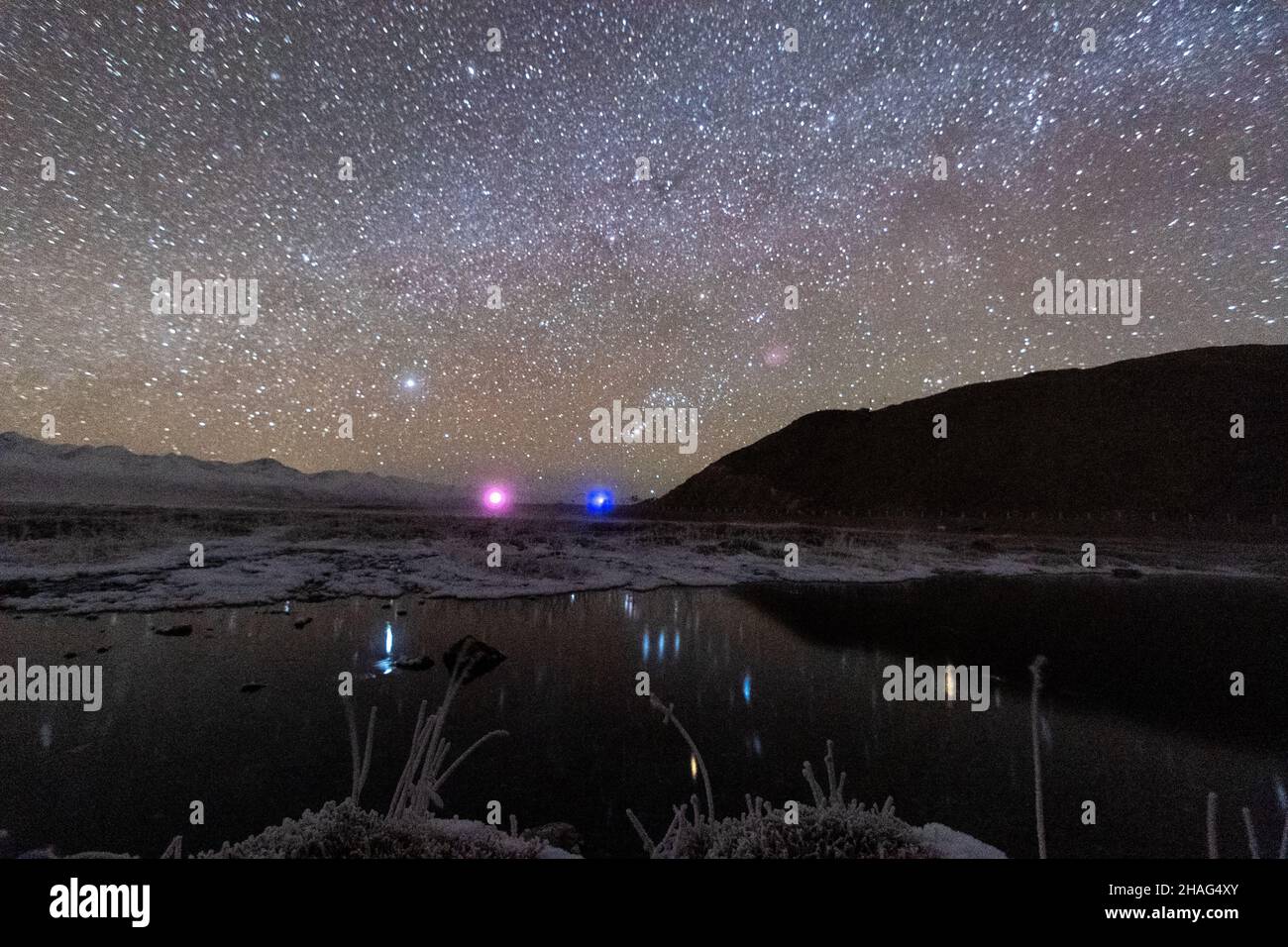BAZHOU, CHINA - DECEMBER 12, 2021 - A Geminid meteor shower streaks across the night sky on the early morning of December 12, 2021, in Bazhou, Xinjian Stock Photo