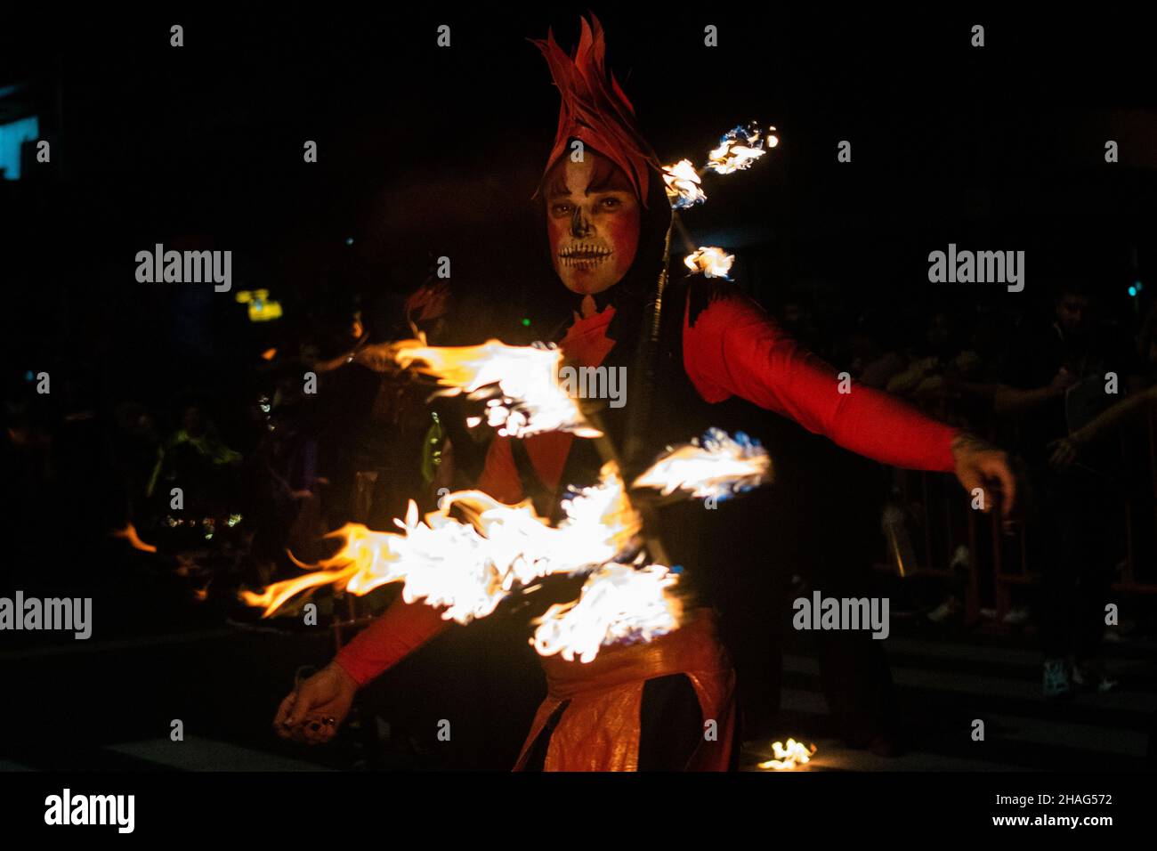 Cultural groups from across Medellin take over the streets for a festive Carnival representing Colombia's myths and legends that opens the Christmas season and Festivities in the City, in Medellin, Colombia on December 8, 2021. Stock Photo