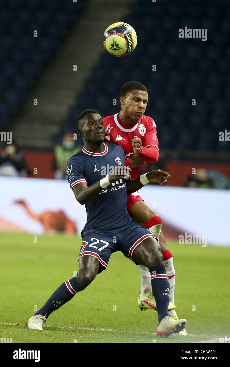 Idrissa Gueye Gana of PSG, Ismail Jakobs of Monaco during the French championship Ligue 1 football match between Paris Saint-Germain (PSG) and AS Monaco (ASM) on December 12, 2021 at Parc des Princes stadium in Paris, France - Photo: Jean Catuffe/DPPI/LiveMedia Stock Photo