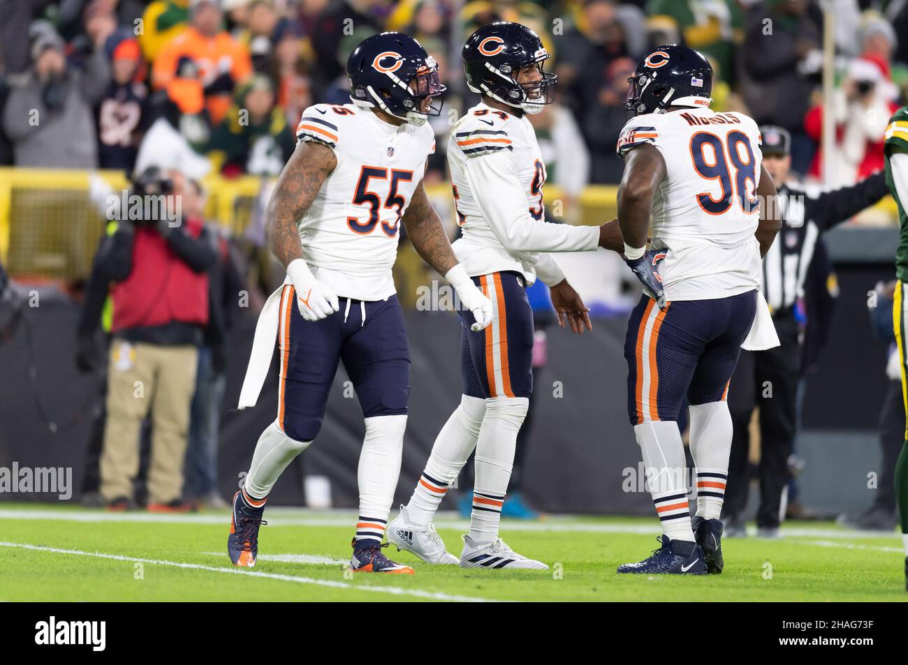 December 12, 2021: Chicago Bears linebacker Bruce Irvin #55, Chicago Bears  outside linebacker Robert Quinn #94, and Chicago Bears defensive end Bilal  Nichols #98 celebrate a sack during NFL football game between