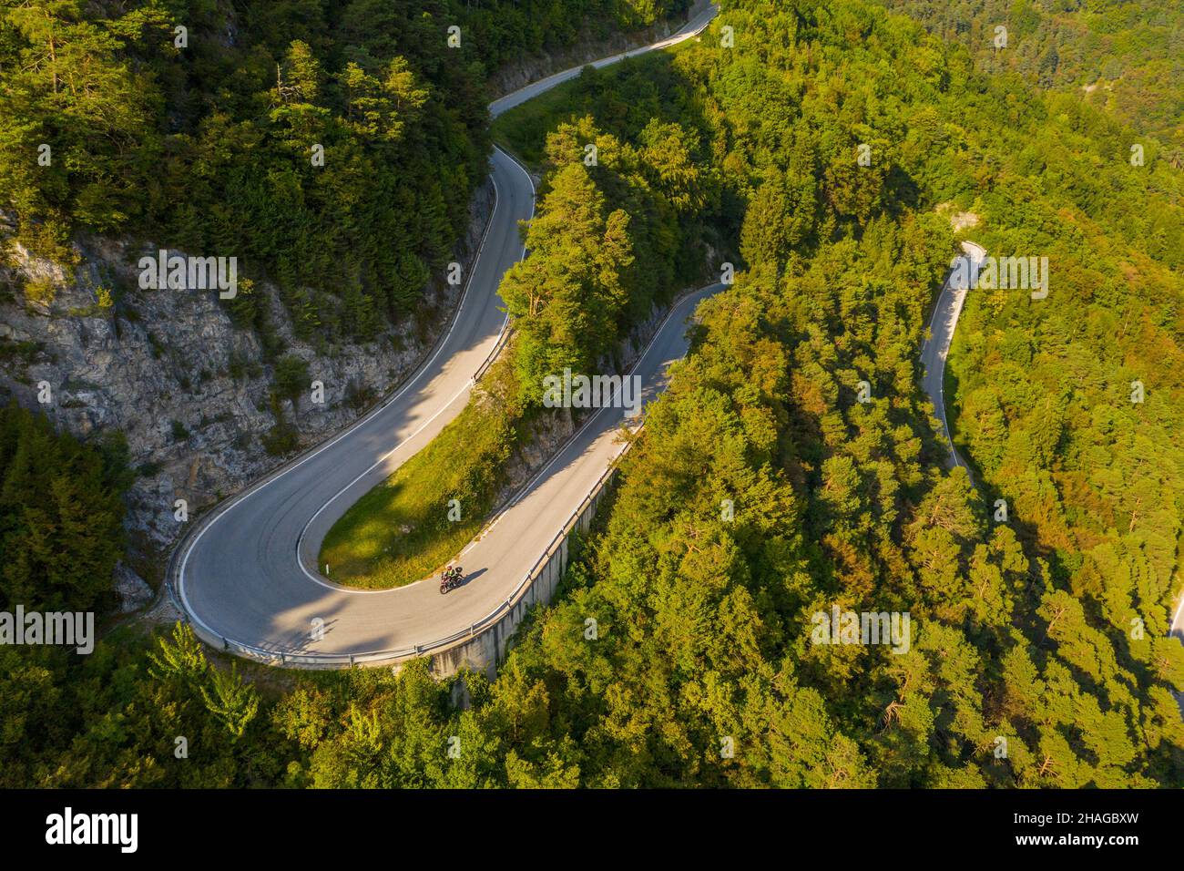 Top view scenic winding country road through green farmland. Clip. Aerial  rural road countryside Stock Photo - Alamy