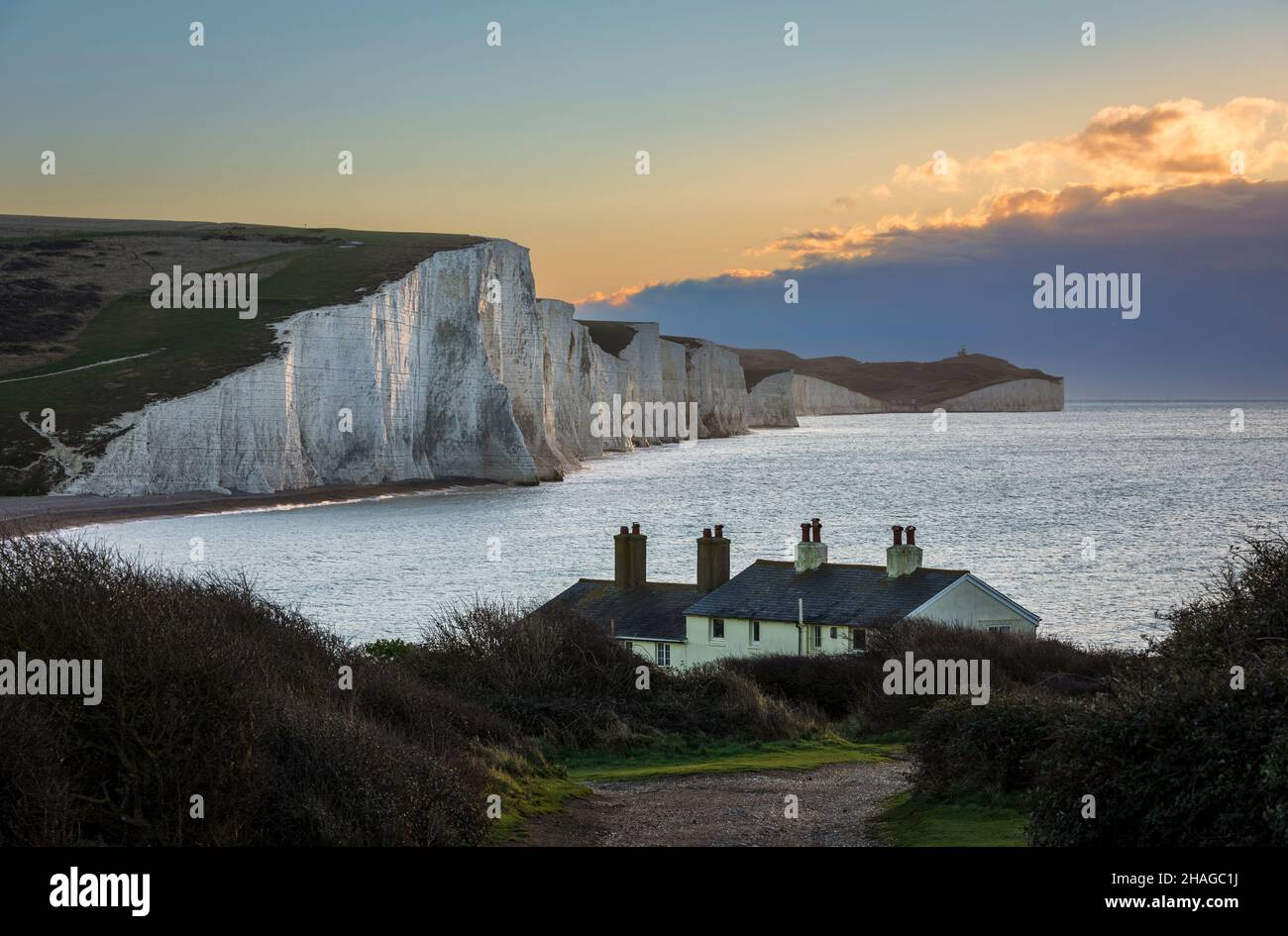 Morning golden hour at the coastguard cottages, Cuckmere Haven, east Sussex, south east England Stock Photo