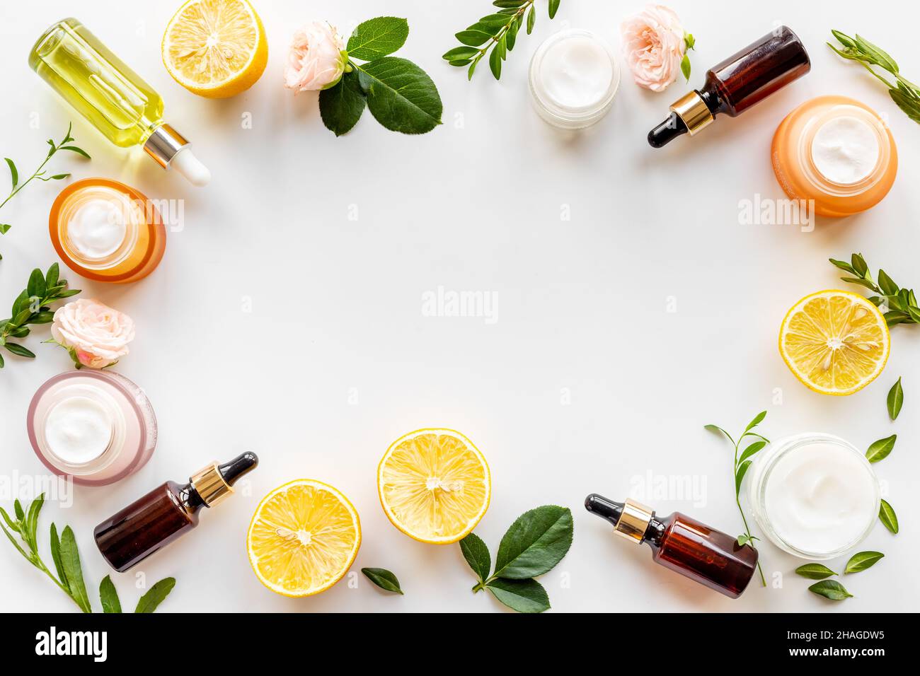 Organic cosmetic ingredients with flowers and herbal oil Stock Photo