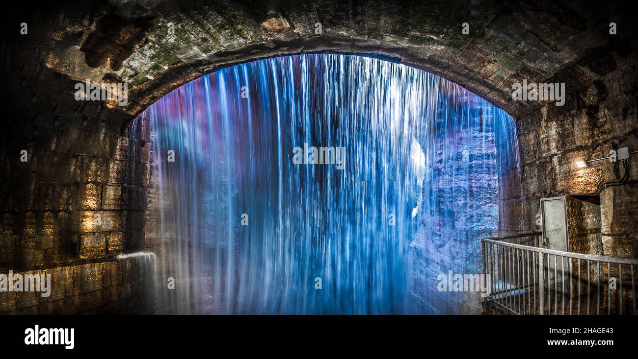 Ravine waterfall tunnel Orrido Ponte Alto ancient hydraulic works in Trento view from behind - Trentino Alto Adige Region of Italy Stock Photo