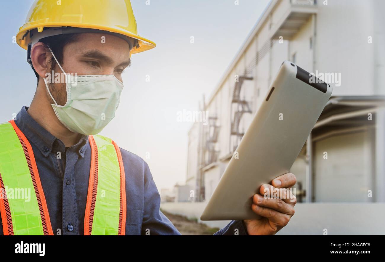 Safety Engineer using tablet inspection efficiency facility