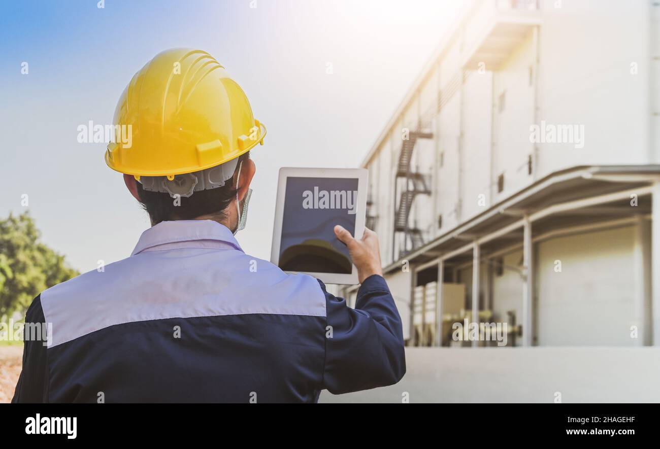 Safety Engineer using tablet inspection efficiency facility