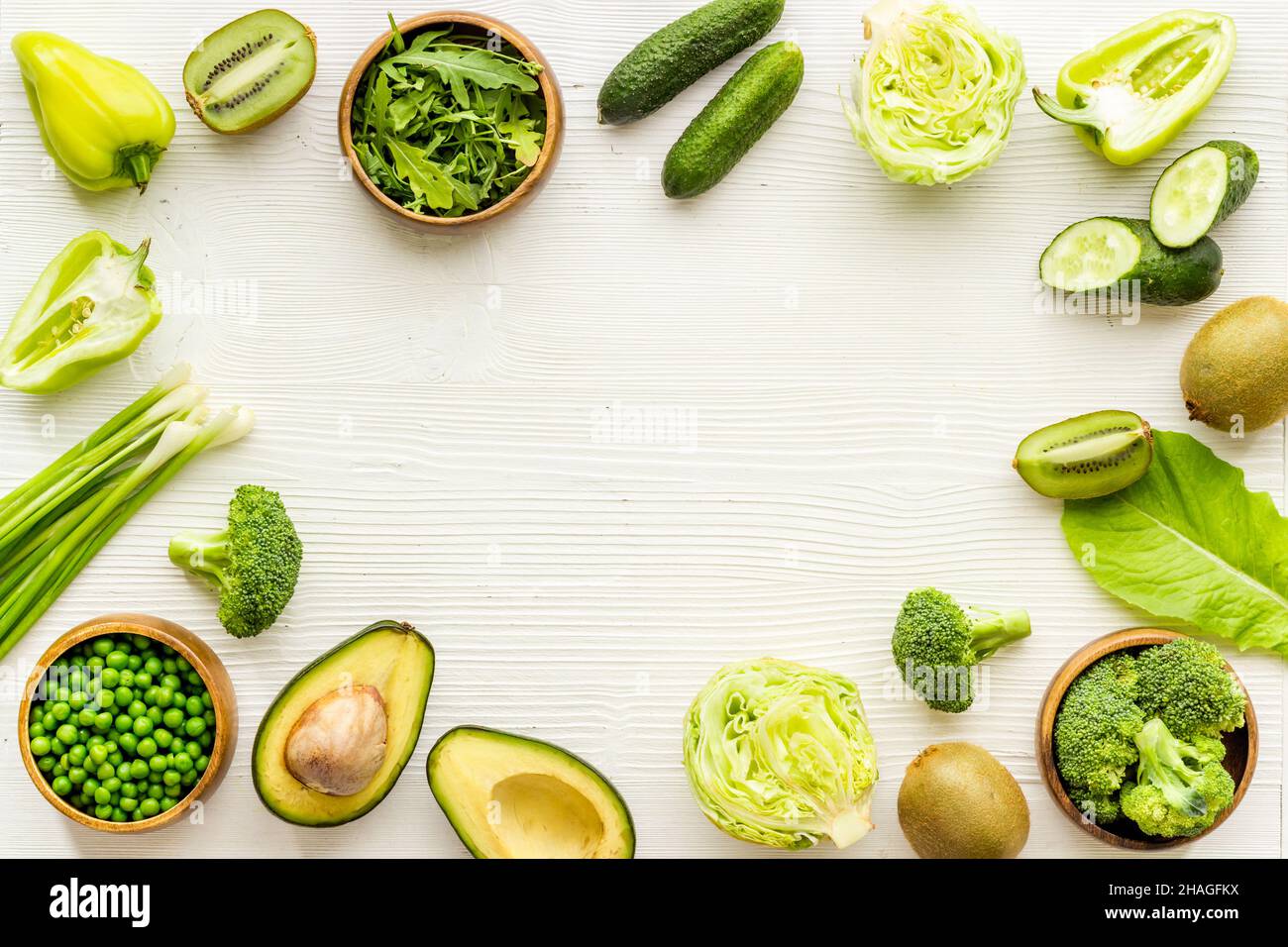 Frame of raw green vegetables and herbs for vegetarian protein diet ...