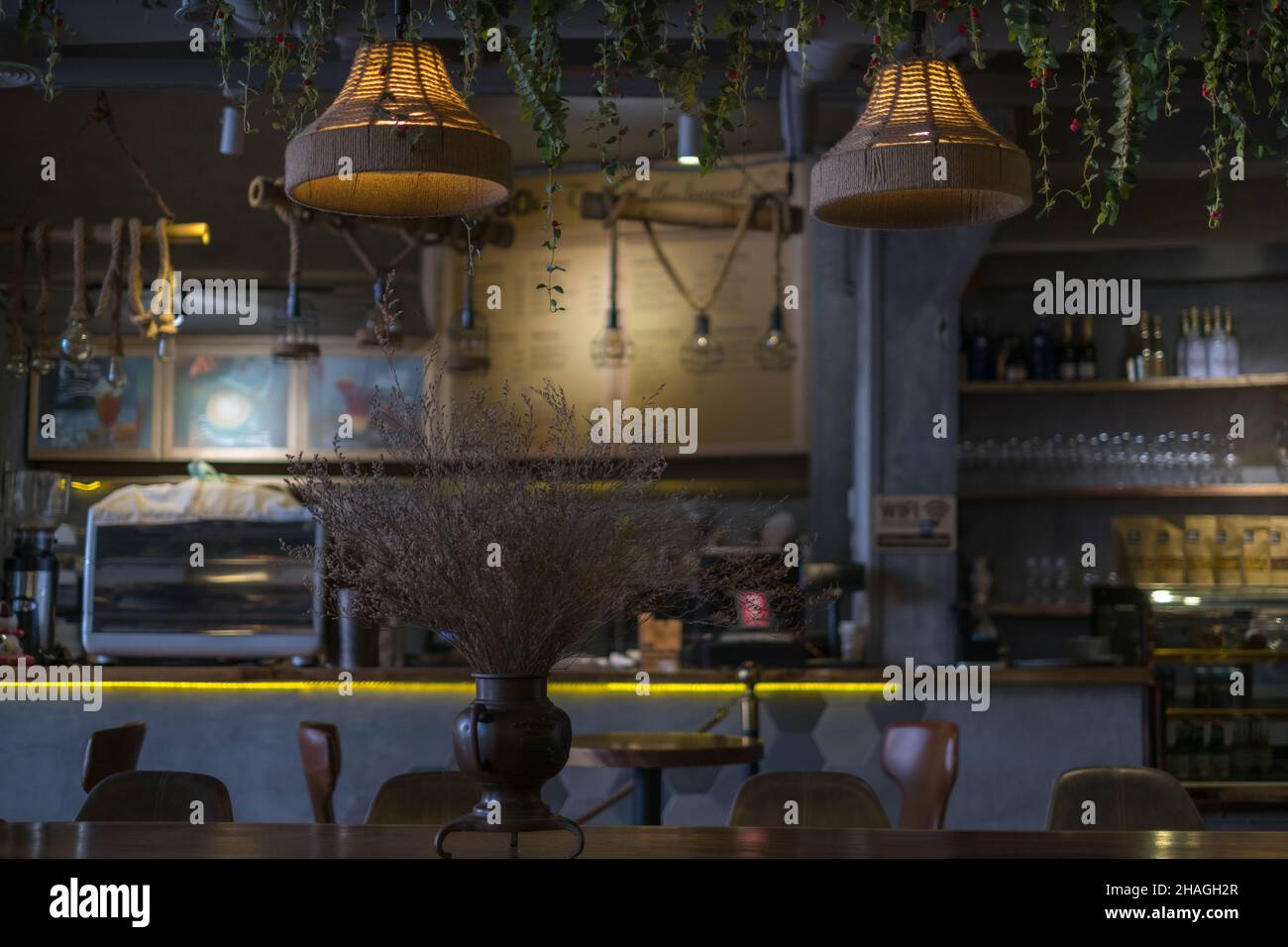 Chandeliers made from the rope. Bar counter in the coffee shop. Coffee ...