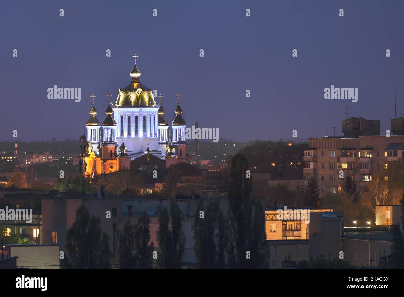 The evening view of the Pokrovsky Cathedral of the city of Rivne, Ukraine is a wonderful pearl of temple architecture, which has become a real embodim Stock Photo