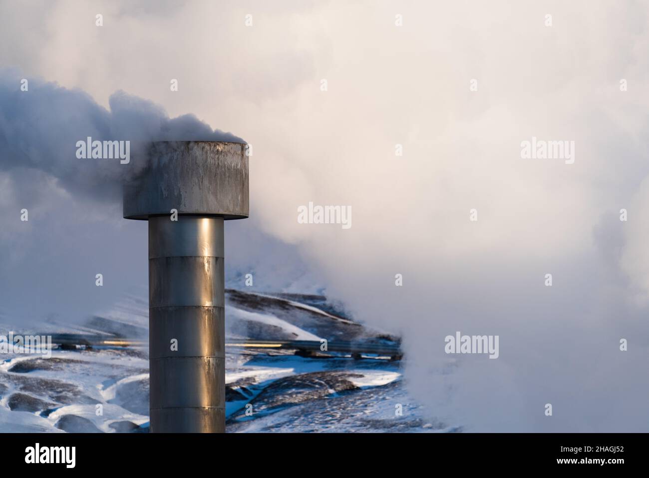 Geothermic plant chimney with with smoke Stock Photo