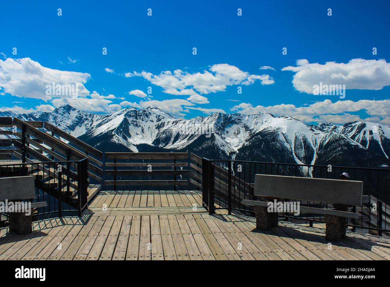 Empty benches for tourists with mountains range background in Banff ...