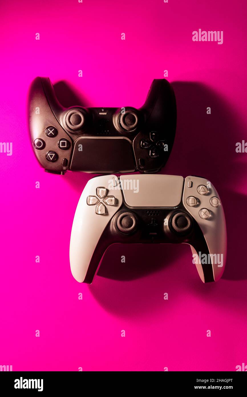 Ukraine - December 10, 2021.Wireless PlayStation 5 Dualsense gamepads. Stock Photo