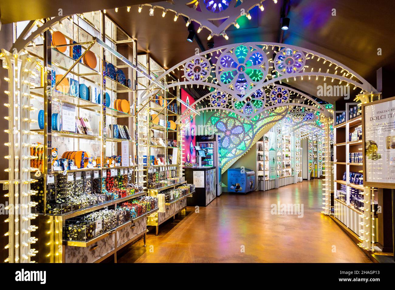 La Via del Dolce decorated with colourful lights at Eataly, London, UK Stock Photo