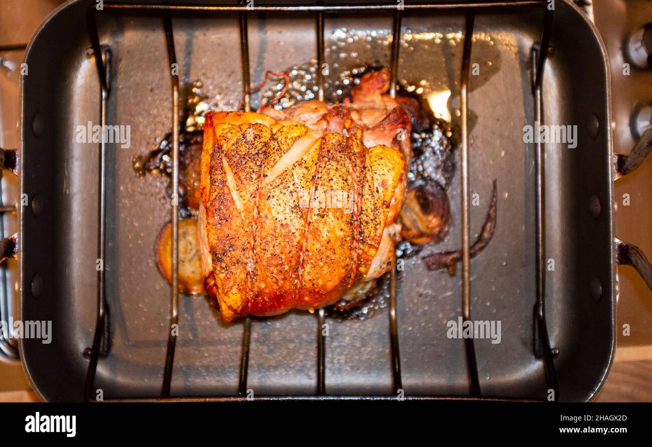 Roast Pork joint with crackling   Photograph taken by Simon Dack Stock Photo