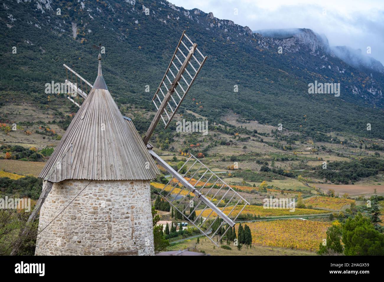 Picturesque view of Cucugnan commune with main landmark 17th-century windmill, Aude department, southern France Stock Photo