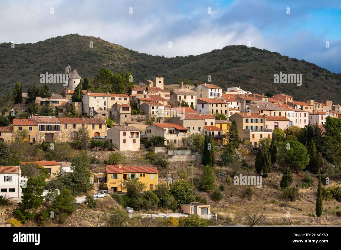 Picturesque view of Cucugnan commune with main landmark 17th-century windmill, Aude department, southern France Stock Photo