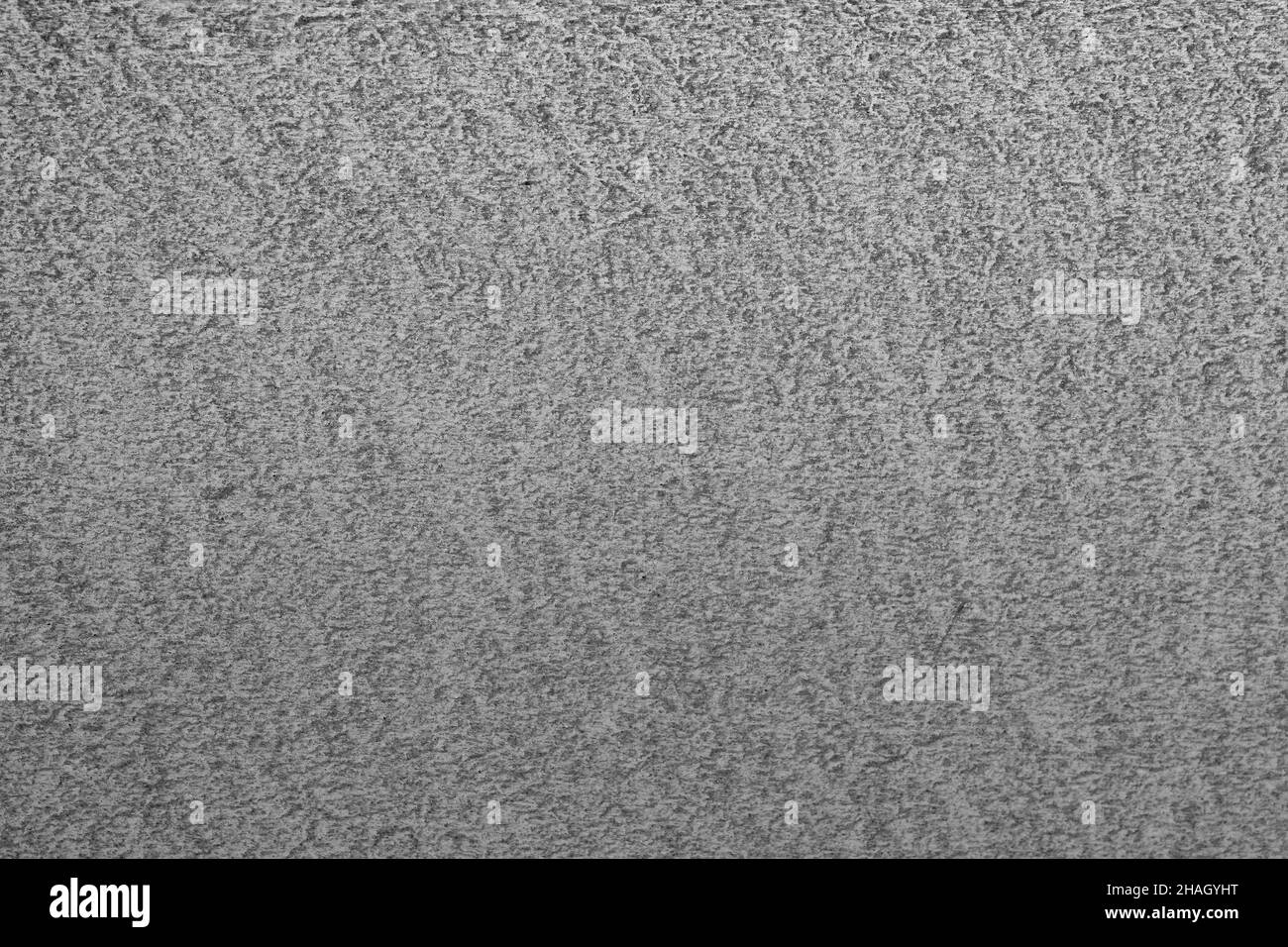 Dirty gray full-frame background with uniform fine grainy texture Stock