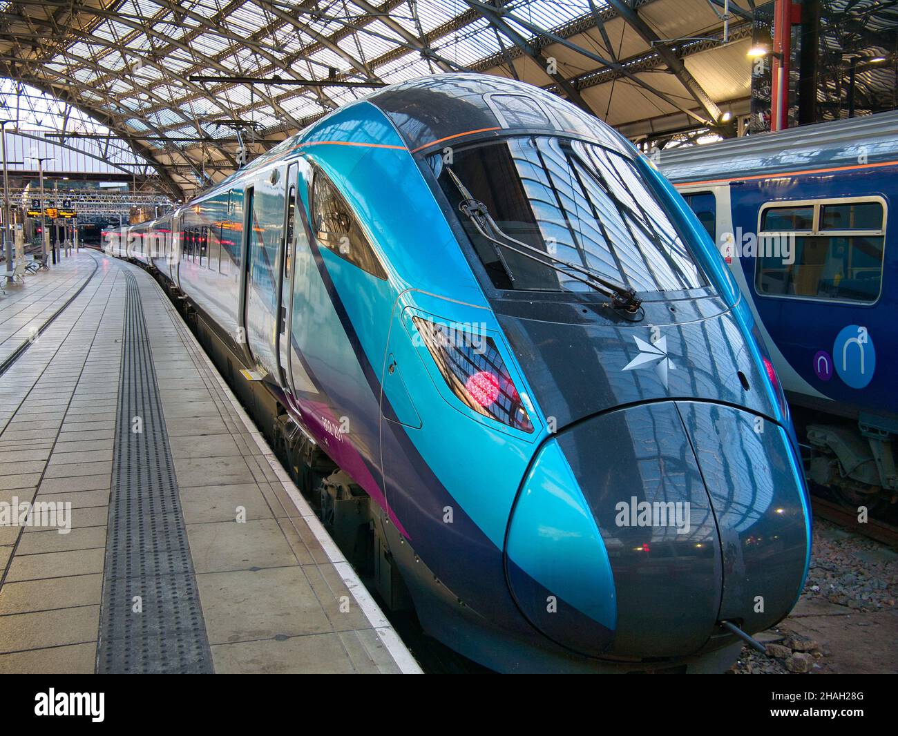 The engine of a TransPennine Express train at Lime Street Station in Liverpool, UK. The train is waiting for passengers to arrive before departing for Stock Photo