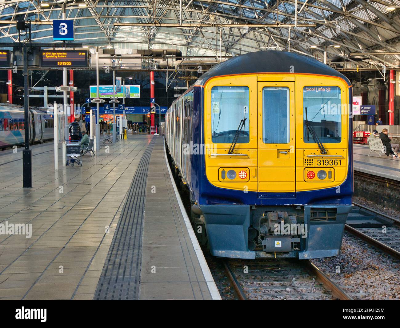 A Northern Rail commuter train waiting at a deserted Platform 3 at Lime Street Station in Liverpool, UK Stock Photo