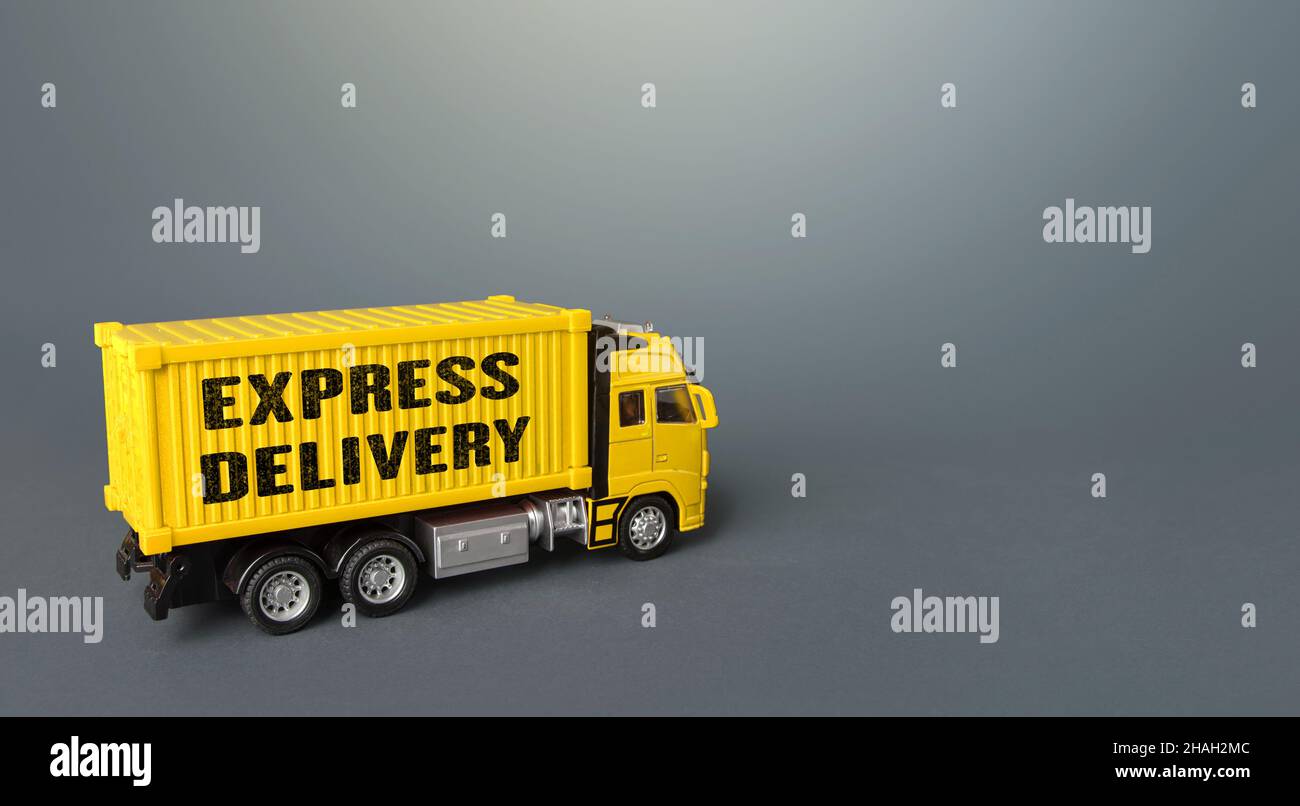 Express delivery yellow truck. Transport service infrastructure. Logistics. Transportation company. Urgent delivery, shipping. Distribution of orders Stock Photo