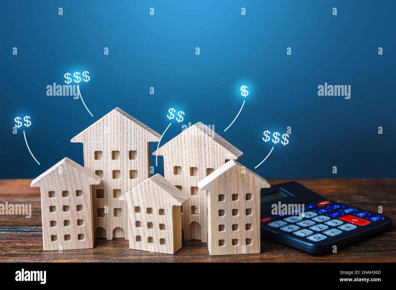 Residential buildings with dollar prices and calculator. Property
