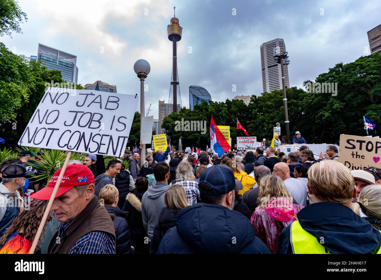 Protest against mandatory covid jabs in Australia. Thousands of people near Sydney Eye Tower on 27 November 2021 protesting government restrictions. Stock Photo
