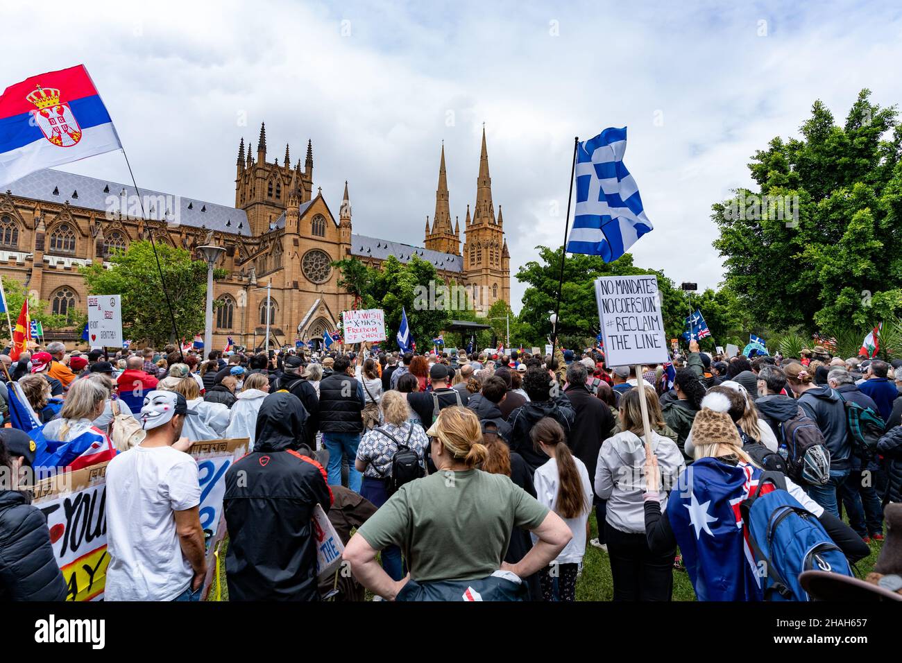 Large crowd of people. Thousands of protesters at demonstration against Australian government vaccine medical apartheid in Sydney at Hyde Park. Stock Photo