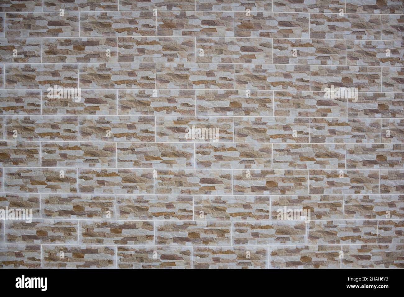 Same stone paving slabs laid out in rows in full frame Stock Photo