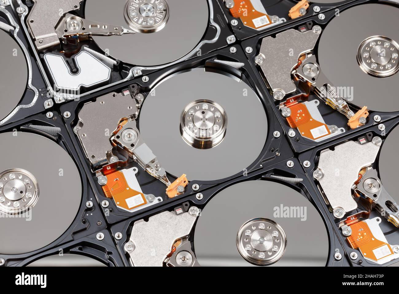 Lots of hard drives in a row, with open covers, close-up Stock Photo