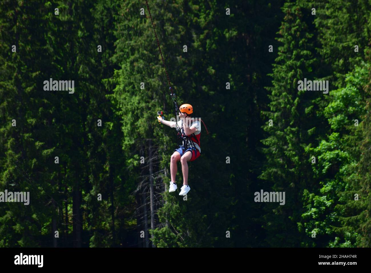 Man swinging on rope hires stock photography and images Alamy