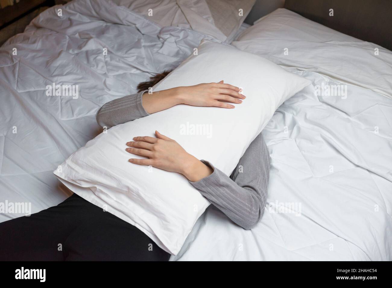 Woman sleeping on the bed Stock Photo