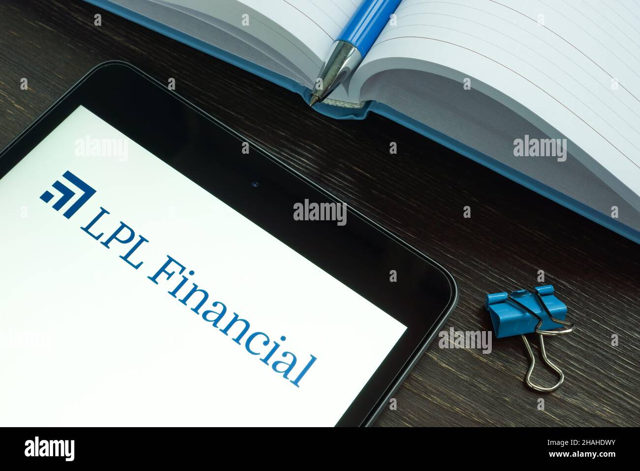 KYIV, UKRAINE - December 03, 2021. LPL financial company logo and notepad. Stock Photo