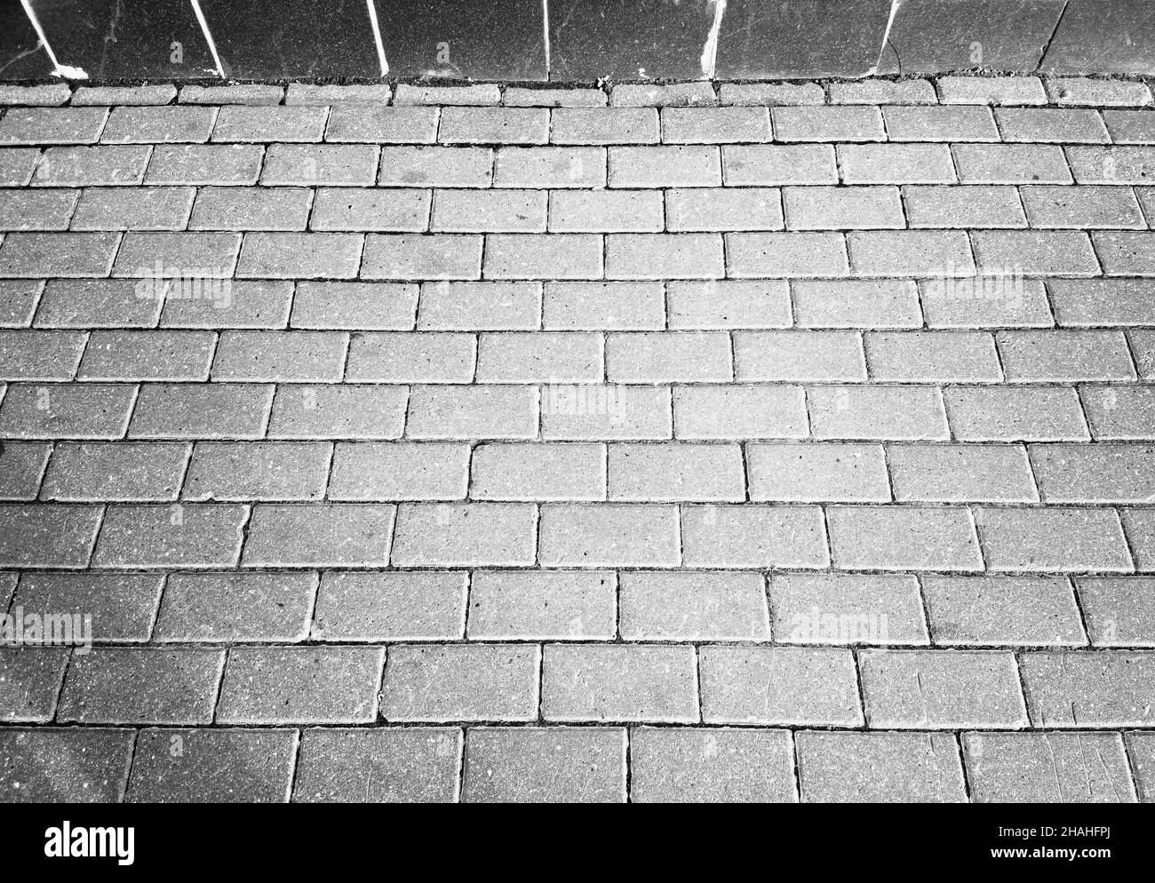 Symmetric pavement tile texture background Stock Photo - Alamy