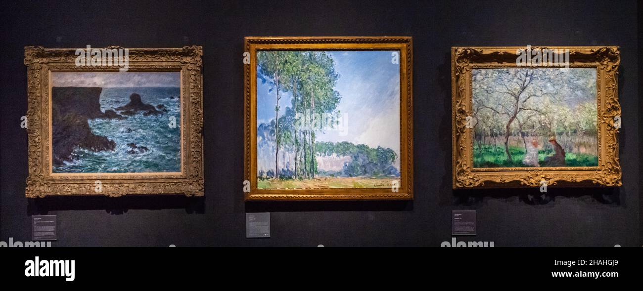Three paintings by the Impressionist artist Claude Monet (1840 - 1926) on display at The Fitzwilliam Museum, Cambridge, UK. Stock Photo
