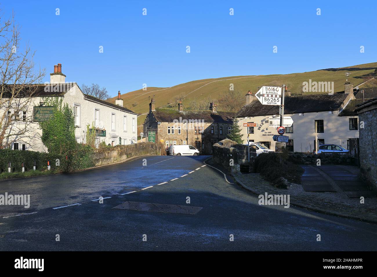 Homes and buildings in the village of Kettlewell, Upper-Warfedale, Yorkshire Dales, including the Racehorses Hotel and Blue Bell Inn Stock Photo