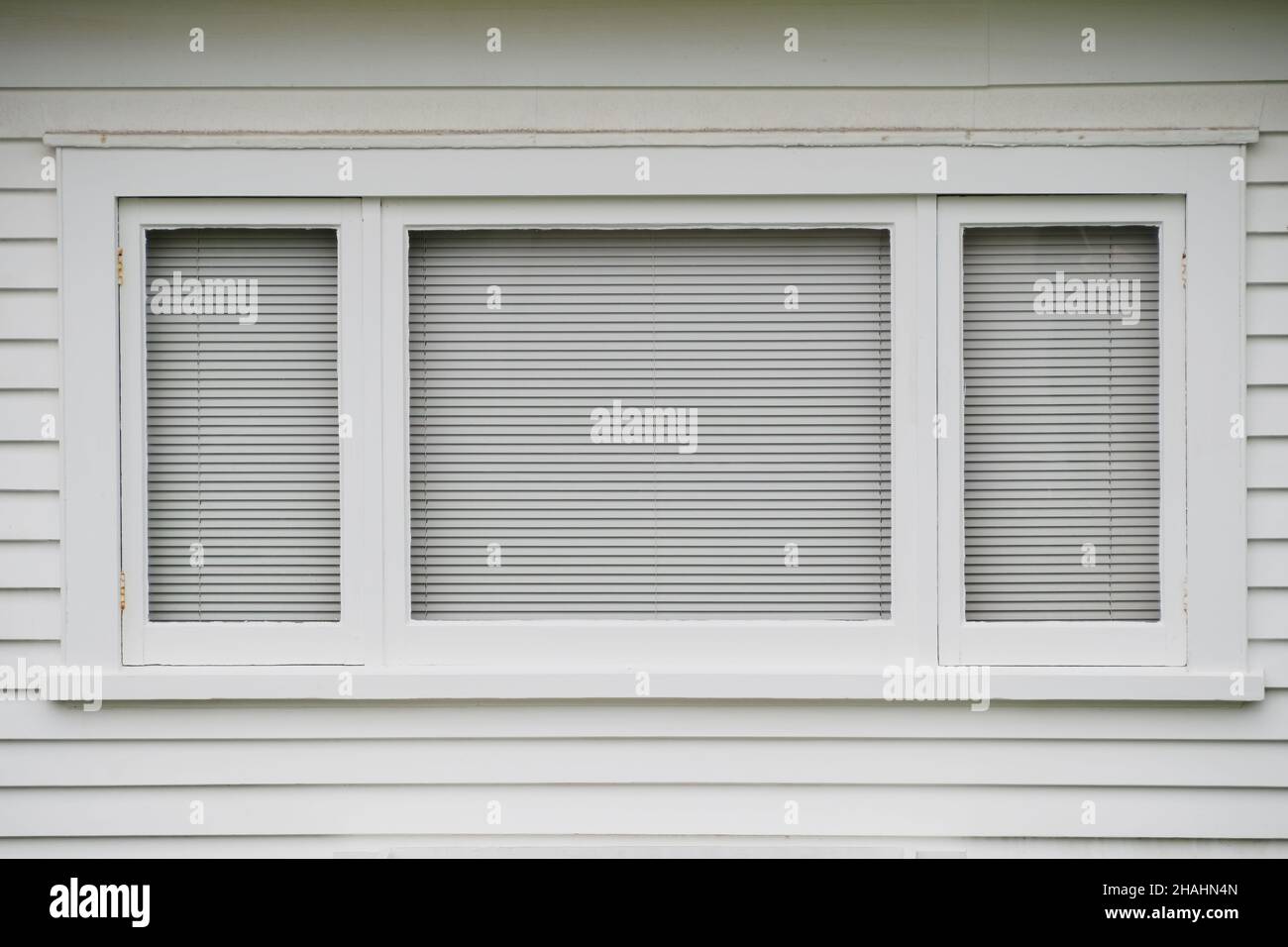typical white wooden window on weatherboard wall Stock Photo - Alamy
