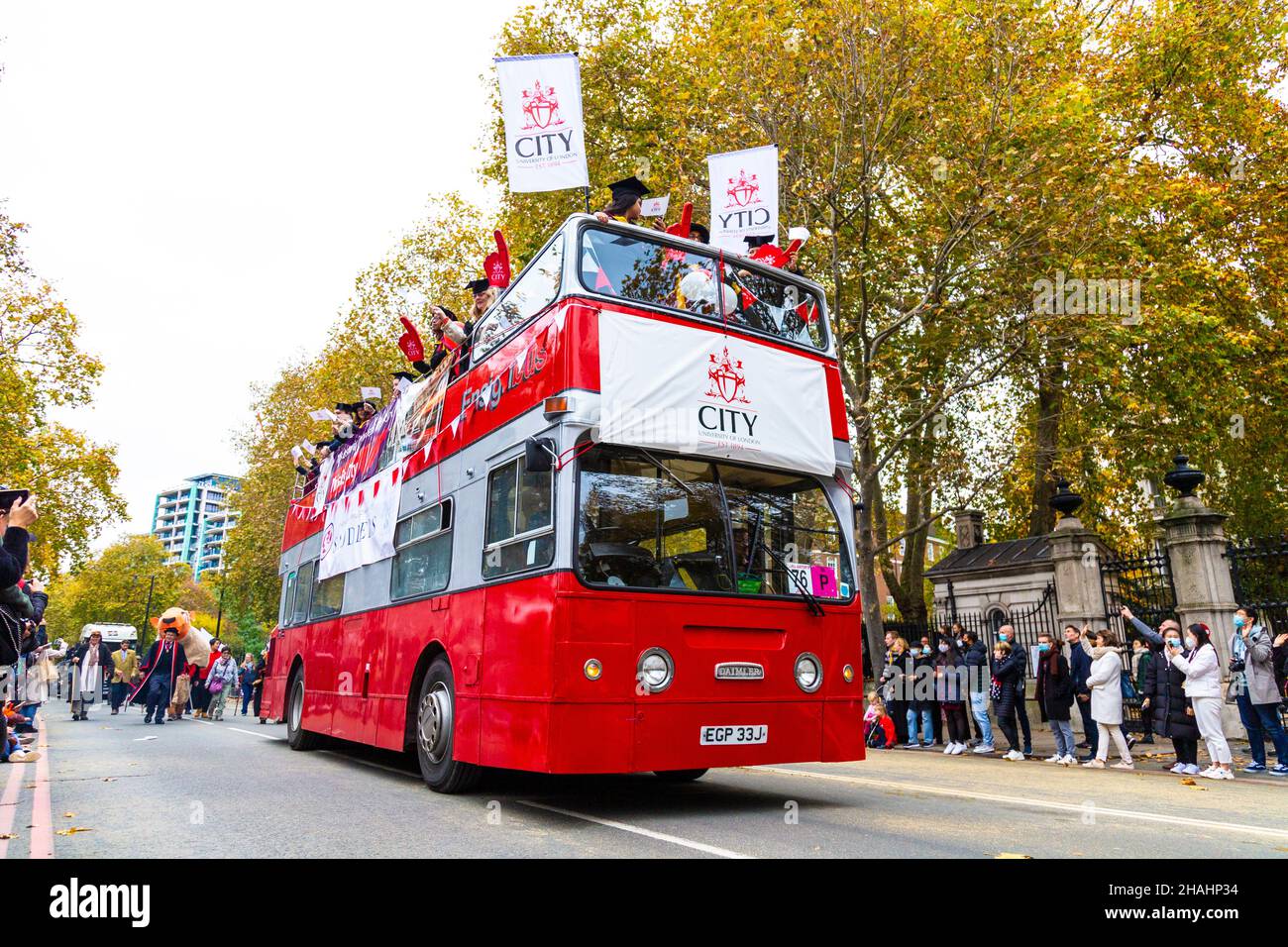 13 November 2021, London, UK - Lord Mayor's Show, City university red double decker bus Stock Photo