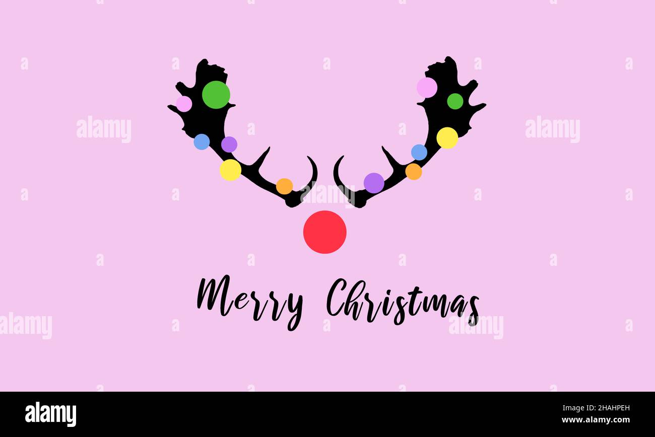 Pink Christmas card with funny deer antlers. Stock Photo